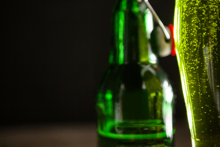 Close-up of green beer and beer bottle for St Patricks Dayの写真素材