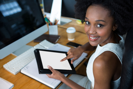 Portrait of female graphic designer using digital tabletの写真素材