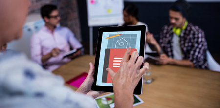 Print against cropped image of woman using digital tabletの写真素材