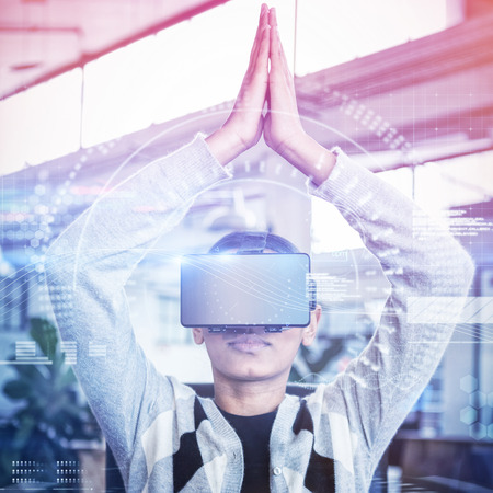 Digitally generated image of speedometer against businesswoman performing yoga while using virtual...