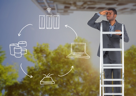 Digital composite of Businessman on a Ladder looking at the future against a city backgroundの写真素材