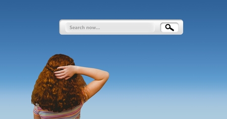 Digital composition of thoughtful girl looking at search bar against blue backgroundの写真素材