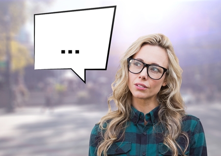 Digital composite image of a woman with speech bubble against blurred background