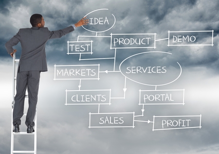 Digital composition of businessman standing on a ladder against business concepts in backgroundの写真素材