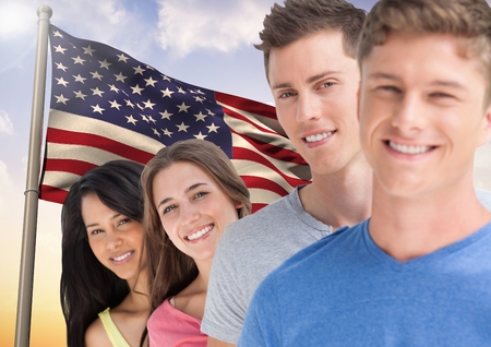 Digital composition of happy teenagers standing against American flag