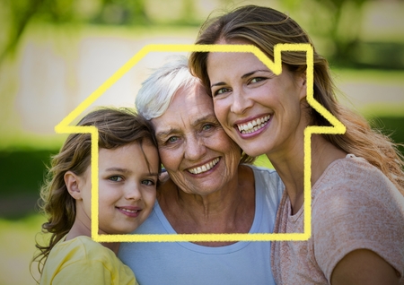 DIgital composite image of mother, daughter and grandmother smiling together in the park with house outlineの写真素材