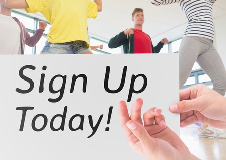 Digital composition of hand holding placard with text sign up todayの写真素材