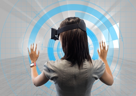 Digital generated image of female executive wearing virtual reality headset with futuristic...