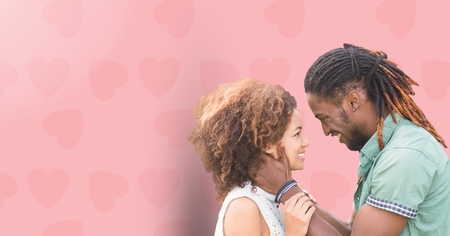 Digital composite image of loving couple against pink backgroundの写真素材