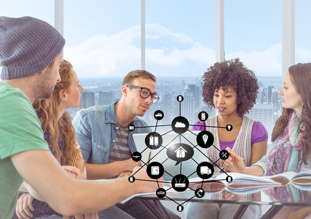 Digital composition of executives discussing over digital tablet in office and networking icons