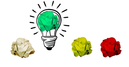 Digital composition of crumpled paper on light bulb shape against white backgroundの写真素材