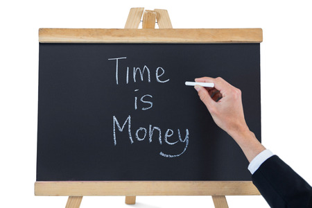 Hand of businessman writing on blackboard against white backgroundの写真素材