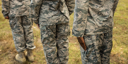 Group of military soldiers standing in line at boot campの写真素材