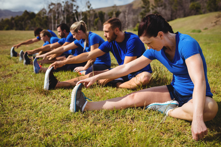 Fit people exercising in boot camp on a sunny dayの写真素材