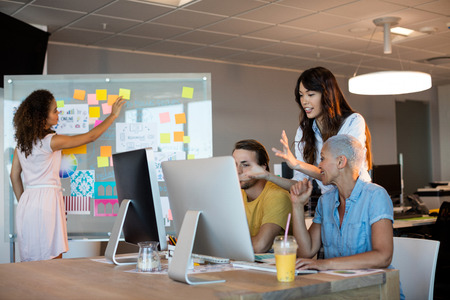 Creative business team working together at officeの写真素材