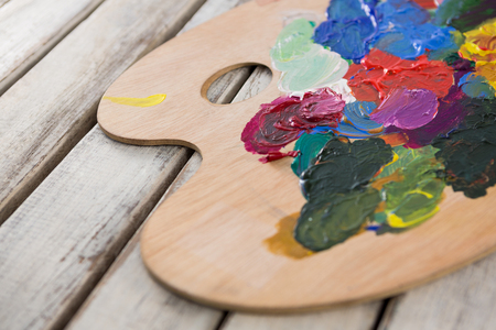 Close-up of wooden palette with various watercolorの写真素材