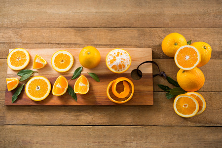 Overhead of oranges on wooden tableの写真素材