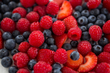 Close-up of various types of fruits on white background