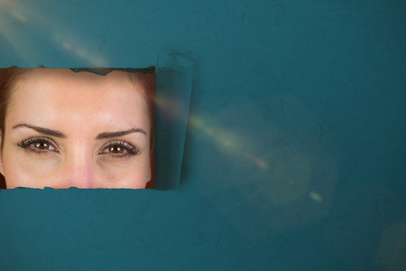 Portrait of beautiful woman making face against red background with vignette 3d