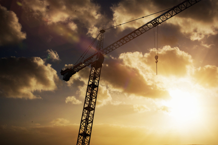Studio Shoot of a crane  against cloudy sky landscapeの写真素材