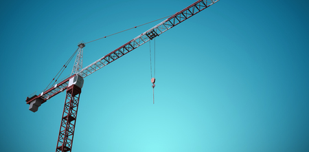Studio Shoot of a crane  against blue vignette backgroundの写真素材