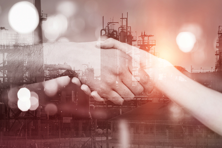 Close-up of a handshake in a barの写真素材
