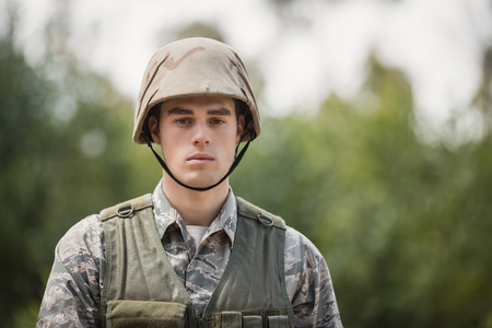 Portrait of handsome military soldier in boot campの写真素材