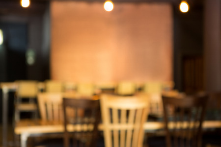 Defocused image of chairs and table in coffee house