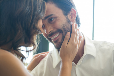 Loving young couple spending leisure time in restaurantの写真素材
