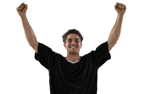 Football player celebrating his victory against white backgroundの写真素材