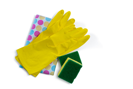 Overhead view gloves with napkin and sponges over white backgroundの写真素材