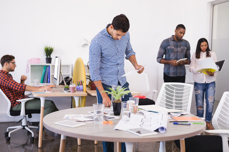 Business people working at desk in officeの写真素材