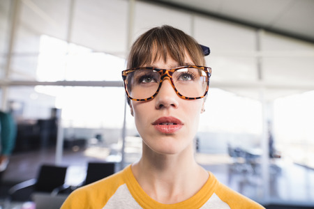 Close up of thoughtful businesswoman looking away