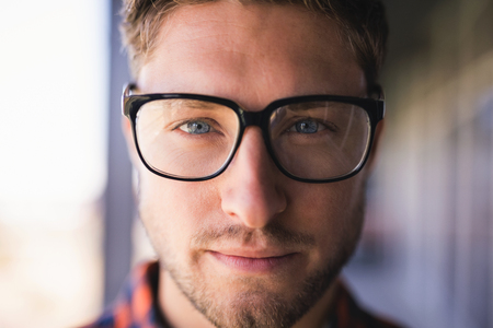 Close up portrait of confident businessman in balcony