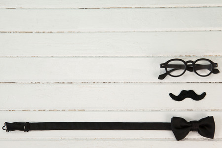 Overhead view of anthropomorphic face on wooden tableの写真素材