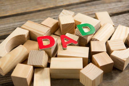 Close up of dad text on wooden blocks at tableの写真素材