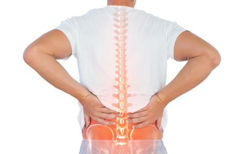 Digital composite of highlighted spine of man with back pain against white backgroundの写真素材