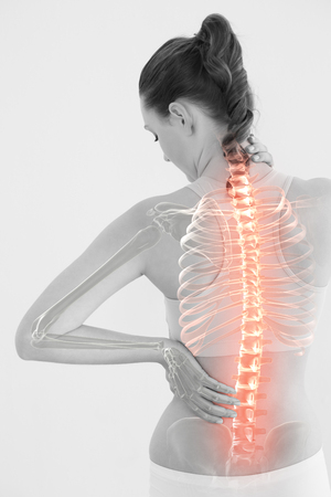 Digitally generated image of woman suffering from muscle pain against white backgroundの写真素材
