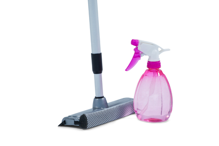 Squeegee mop with cleaning spray bottle on a white backgroundの写真素材