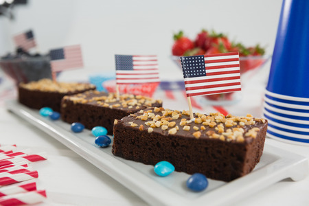 Sweet food decorated with 4th July theme on trayの写真素材