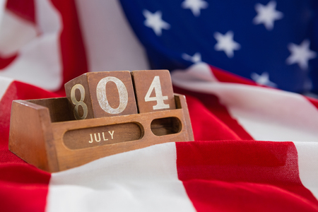 Close-up of perpetual calendar on American flagの写真素材