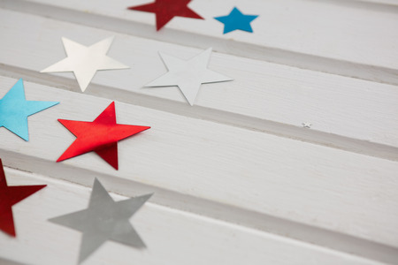Close-up of star shape decoration arranged on wooden tableの写真素材