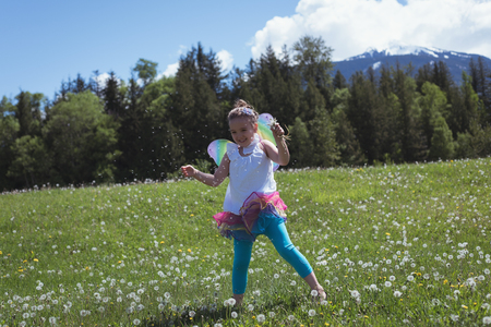 Happy Girl playing in parkの写真素材