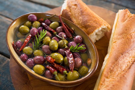 Close-up of pickled olives with breadの写真素材