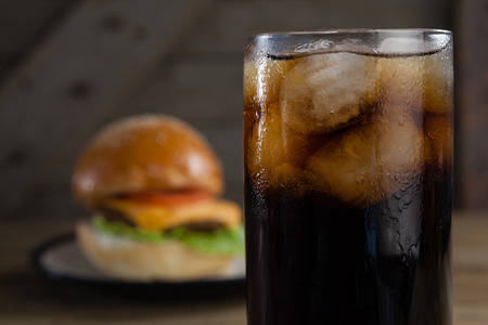 Close-up of cold drink on wooden tableの写真素材