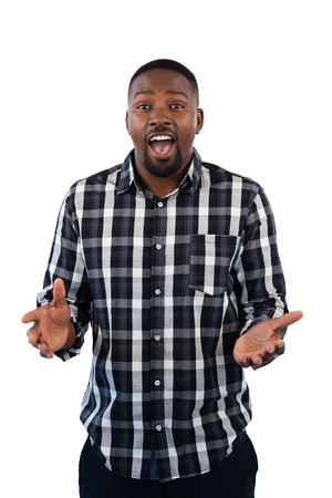 Portrait of surprised man against white backgroundの写真素材