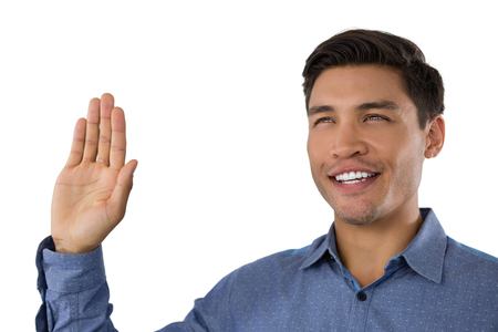 Close up of businessman waving hand against white backgroundの写真素材