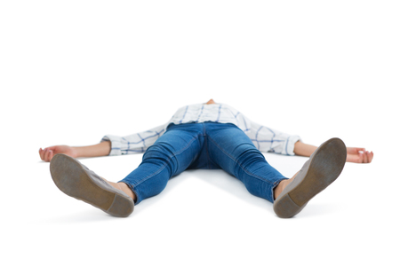 Unconscious woman lying on white backgroundの写真素材