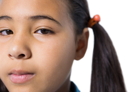 Portrait of girl against white backgroundの写真素材