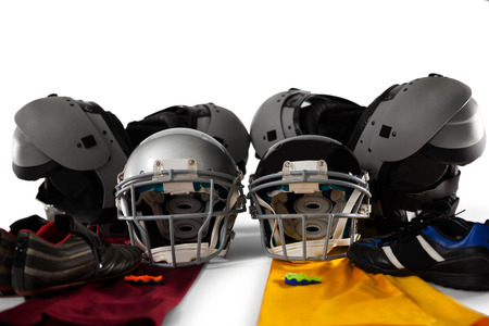 Chest protector with sports gears against white backgorund